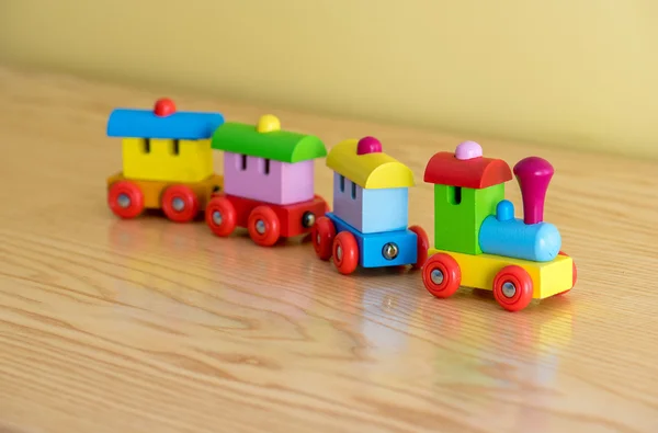 Wooden toy train with colorful blocs — Stock Photo, Image