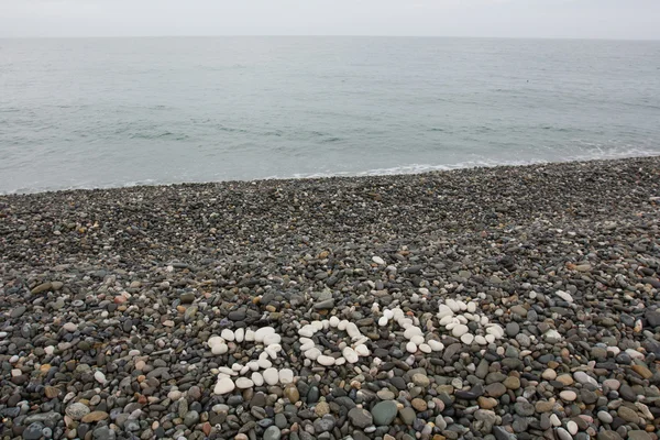 El signo 2016 hecho de guijarros blancos — Foto de Stock