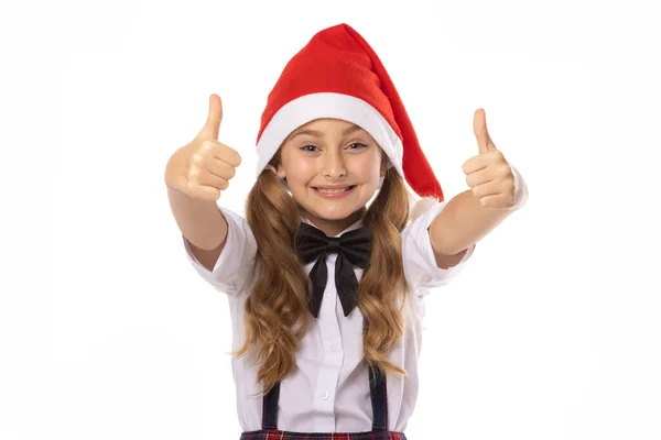 Закрыть Портрет Счастливая Маленькая Девочка Шляпе Санта Клауса Большие Пальцы — стоковое фото