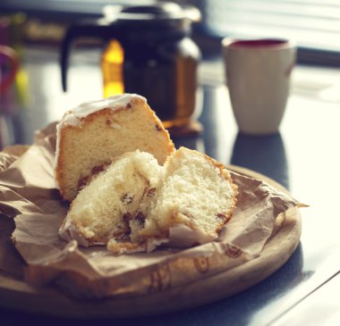 Fresh bread rolls and green tea for breakfast in the morning.