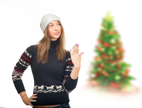 Woman in winter sweater showing a sign that she was surprised. — Stockfoto