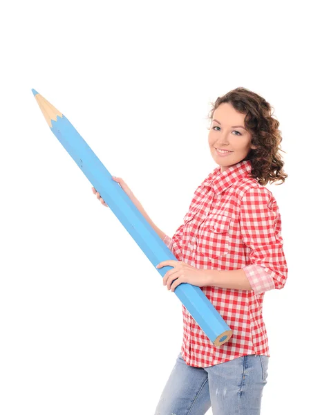 Young pretty woman with giant blue pencil — Stock Photo, Image