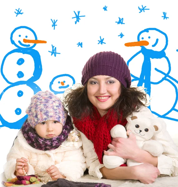 Mother and daughter in winter clothes — Stock Photo, Image