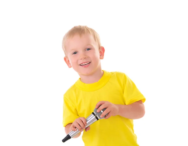 Boy in yellow shirt with microphone — Stock Photo, Image