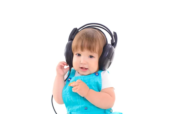 Cute baby wearing headphones — Stock Photo, Image