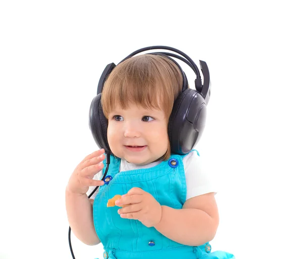 Lindo bebé con auriculares — Foto de Stock