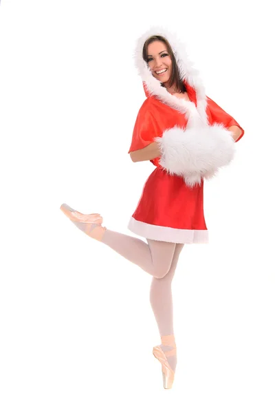 Professionele ballerina tiptoe in rode Kerstmis jurk — Stockfoto