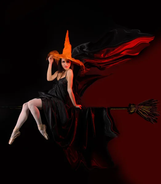 Halloween witch on broom — Stock Photo, Image