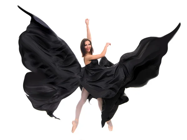 Bailarina de ballet en satén negro Imágenes de stock libres de derechos