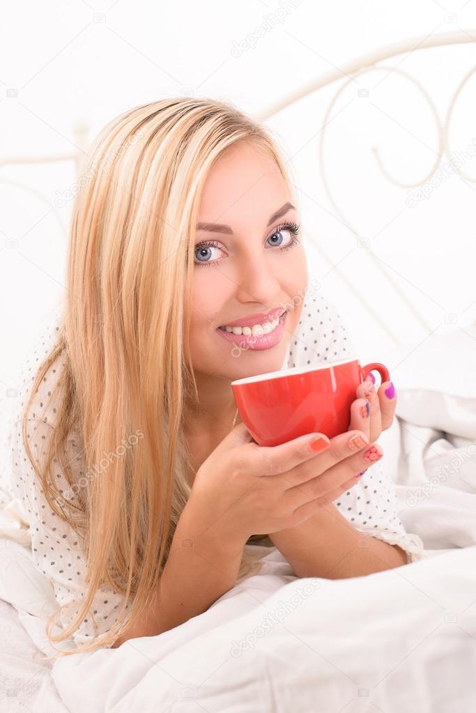 girl drinking her morning coffee