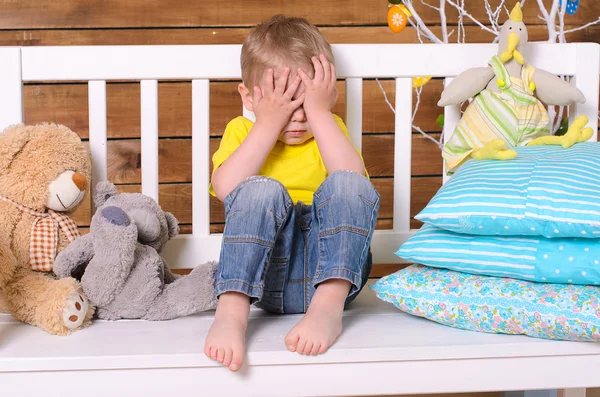 Boy closing his eyes with hands — Stock Photo, Image