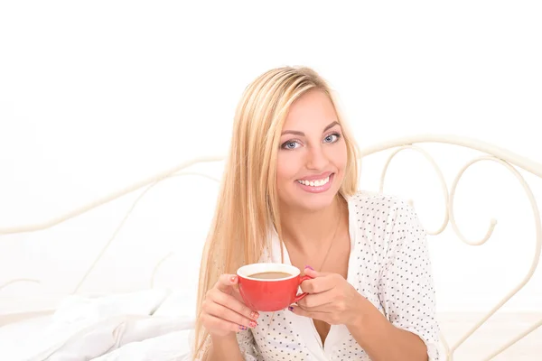 Sensual chica rubia bebiendo su café de la mañana —  Fotos de Stock