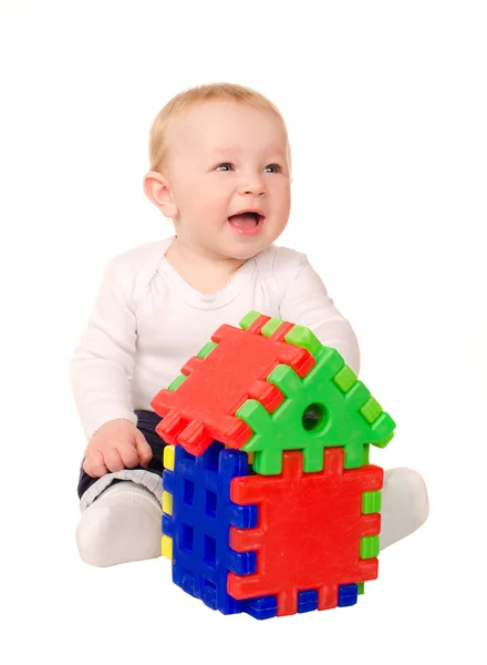 Bebé niño jugando con la construcción de rompecabezas Imagen de stock