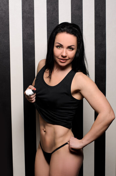 young sporty woman in black underwear