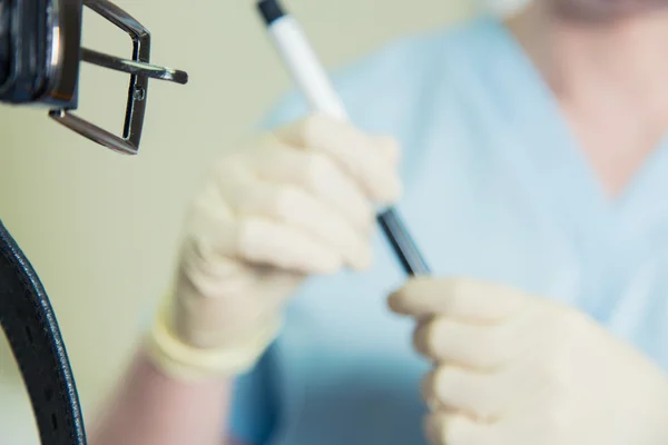 Healthcare, technology medicine concept - serious doctor with  and patient in hospital behind the Curtain — Stock Photo, Image