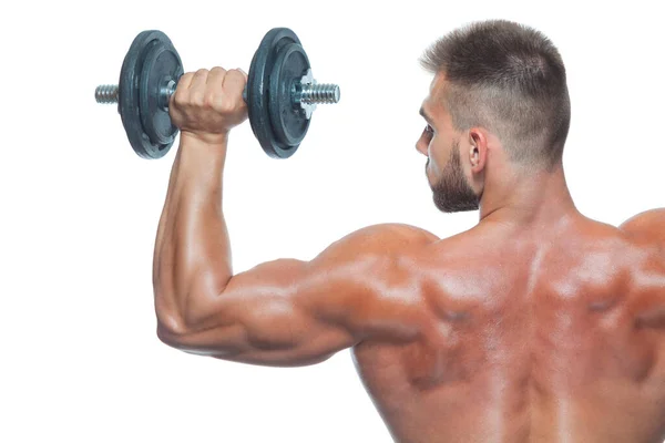 Close up back view on bodybuilders strong muscular arm lifting a dumbbell isolated on white background — Stock Photo, Image
