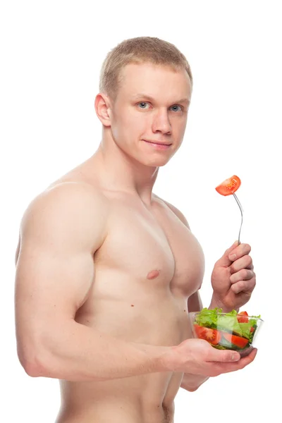 Hombre de cuerpo en forma y saludable sosteniendo una ensaladera fresca, en forma abdominal, aislado sobre fondo blanco, retocado de color, en topless — Foto de Stock