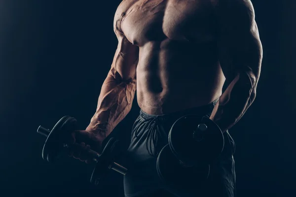 Muscle man doing bicep curls. — Stock Photo, Image