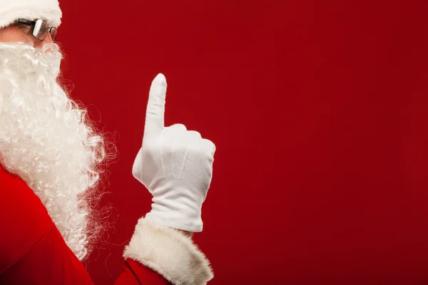 サンタ クロースの写真は手袋手ジェスチャーを指しているのです。指 — ストック写真