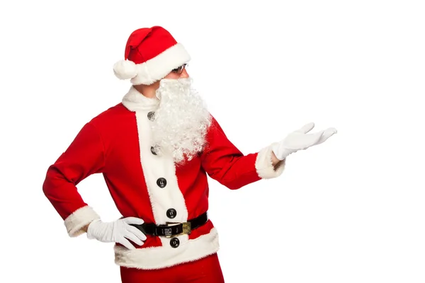Santa Claus señalando signo con sonrisa, aislado sobre fondo blanco —  Fotos de Stock