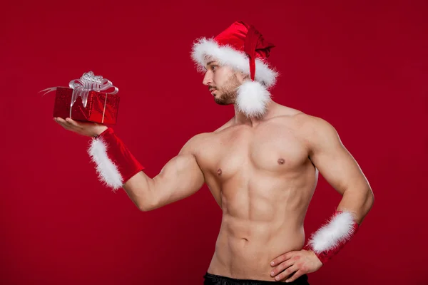 Sexy santa claus tiene sorpresa para usted —  Fotos de Stock