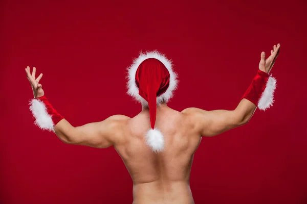 Hombre musculoso sexy en uniforme de santa. Navidad Año Nuevo —  Fotos de Stock