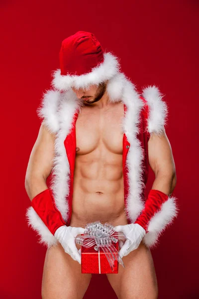 Sexy santa claus has surprise for you — Stock Photo, Image