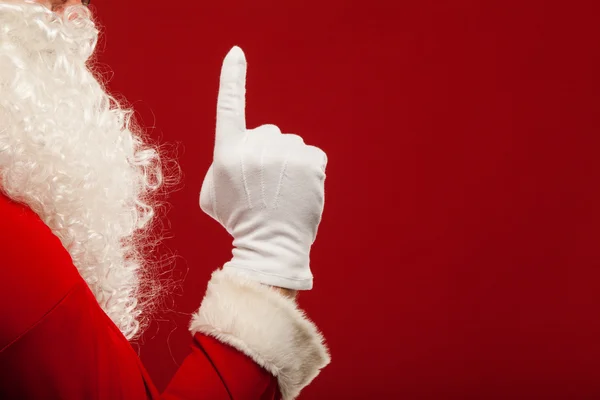 サンタ クロースの写真は手袋手ジェスチャーを指しているのです。指 — ストック写真