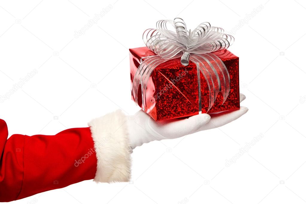Santa claus giving  christmas present box on a white background, isolated