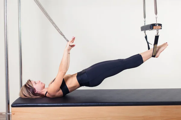 Pilates aerobic instructor woman in cadillac fitness exercise — Stock Photo, Image