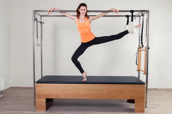 Pilates aerobic instructor woman in cadillac fitness exercise — Stock Photo, Image