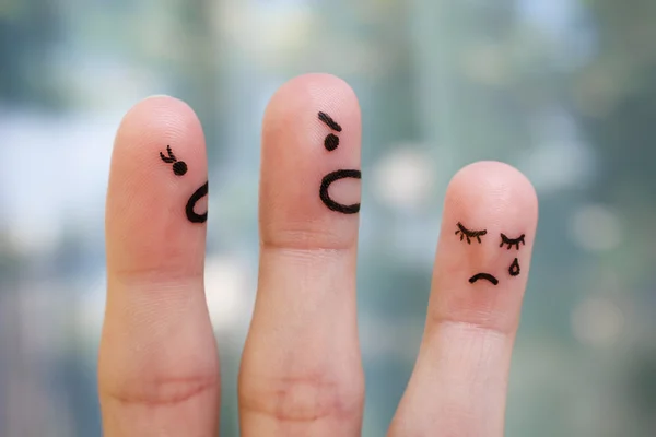 Finger art of family  during quarrel. The concept of parents scolded her daughter, she was crying.