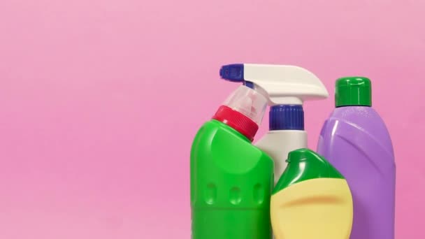 On the right are four bottles of cleaning detergent. Copy space on the left. — ストック動画