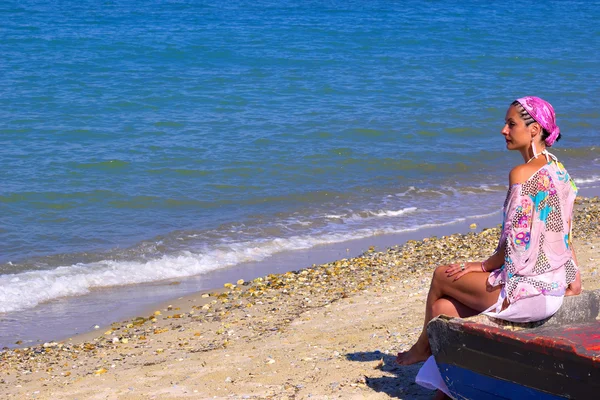 Genieten van de zon en de zee — Stockfoto