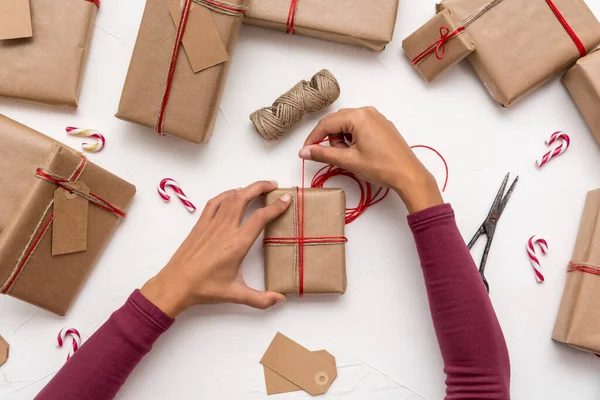 Female Hands Wrapping Christmas Gift Boxes Decorated Kraft Paper — Stock Photo, Image