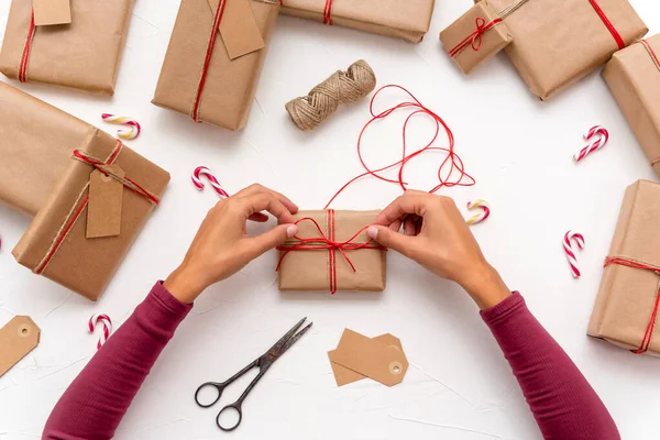 Female Hands Wrapping Christmas Gift Boxes Decorated Kraft Paper — Stock Photo, Image