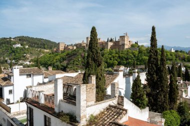 View of Granada From The Albayzin city with Alhambra on a sunny day. Andalusia, Spain
