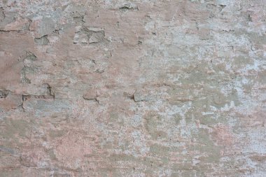 Duvardaki eski tuğla duvar alçısının dokusu eski tuğla duvar arka planında.