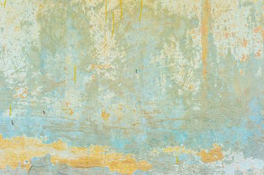 Bir sokak evinin duvarında eski yeşil alçı dokusu soyut renkli duvar dokusu ve arka plan