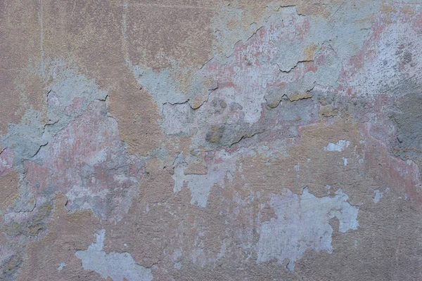 家の中で屋外石膏の暖かい色合いヴィンテージテクスチャグランジ壁のテクスチャの古い剥離石膏 — ストック写真