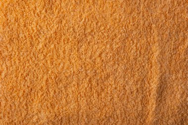 Turuncu havlunun dokusu yakın plan, üst görünüm.