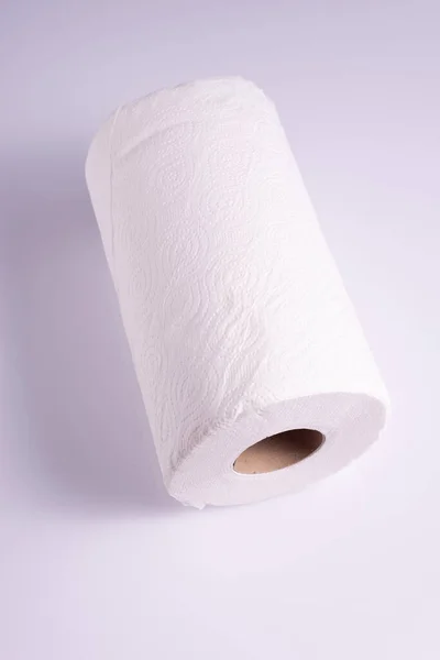 Roll of white paper towels napkins on white table — Stock Photo, Image