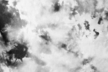 Eskimiş bir kitap kapağı, koyu ekran desenli. siyah ve beyaz soyut kumaş dokusu, duvar kağıdı, üst görünüm