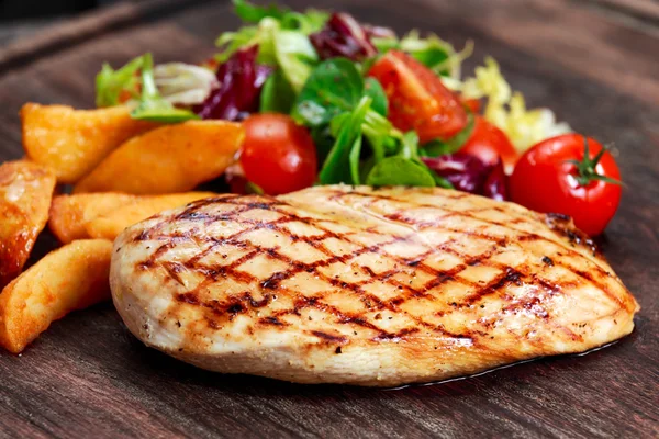 Grilled Chicken breast. with potato and vegetables