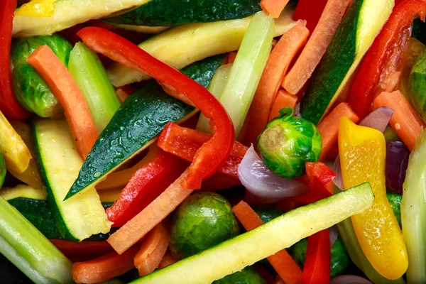 Kokta rostade grönsaker i närheten upp, bakgrund — Stockfoto