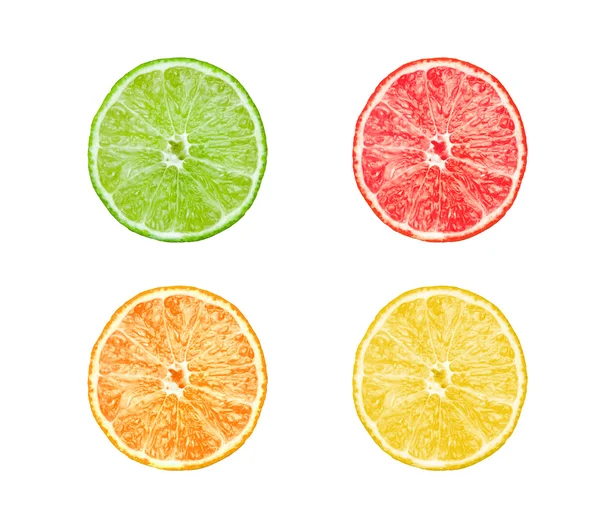 Collectie van citrus segmenten - sinaasappel-, citroen-, kalk- en grapefruitsap geïsoleerd op witte achtergrond — Stockfoto