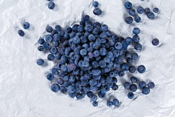 Fresh Juicy Blueberries on crumpled paper. Rich with vitamins. — Zdjęcie stockowe