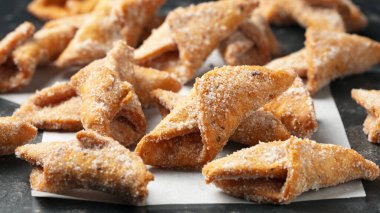 Angel Wings, Faworki, cakes. sweet pastry deep fried and sprinkled with powdered sugar