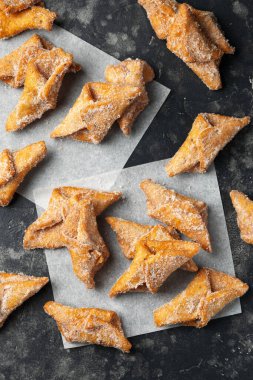 Angel Wings, Faworki, cakes. sweet pastry deep fried and sprinkled with powdered sugar