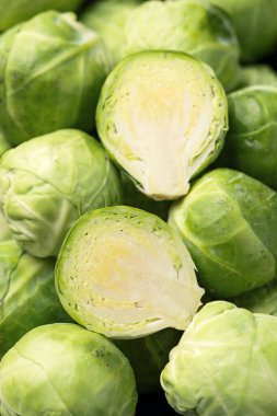Fresh Brussels Sprouts in a black plate. Healthy food